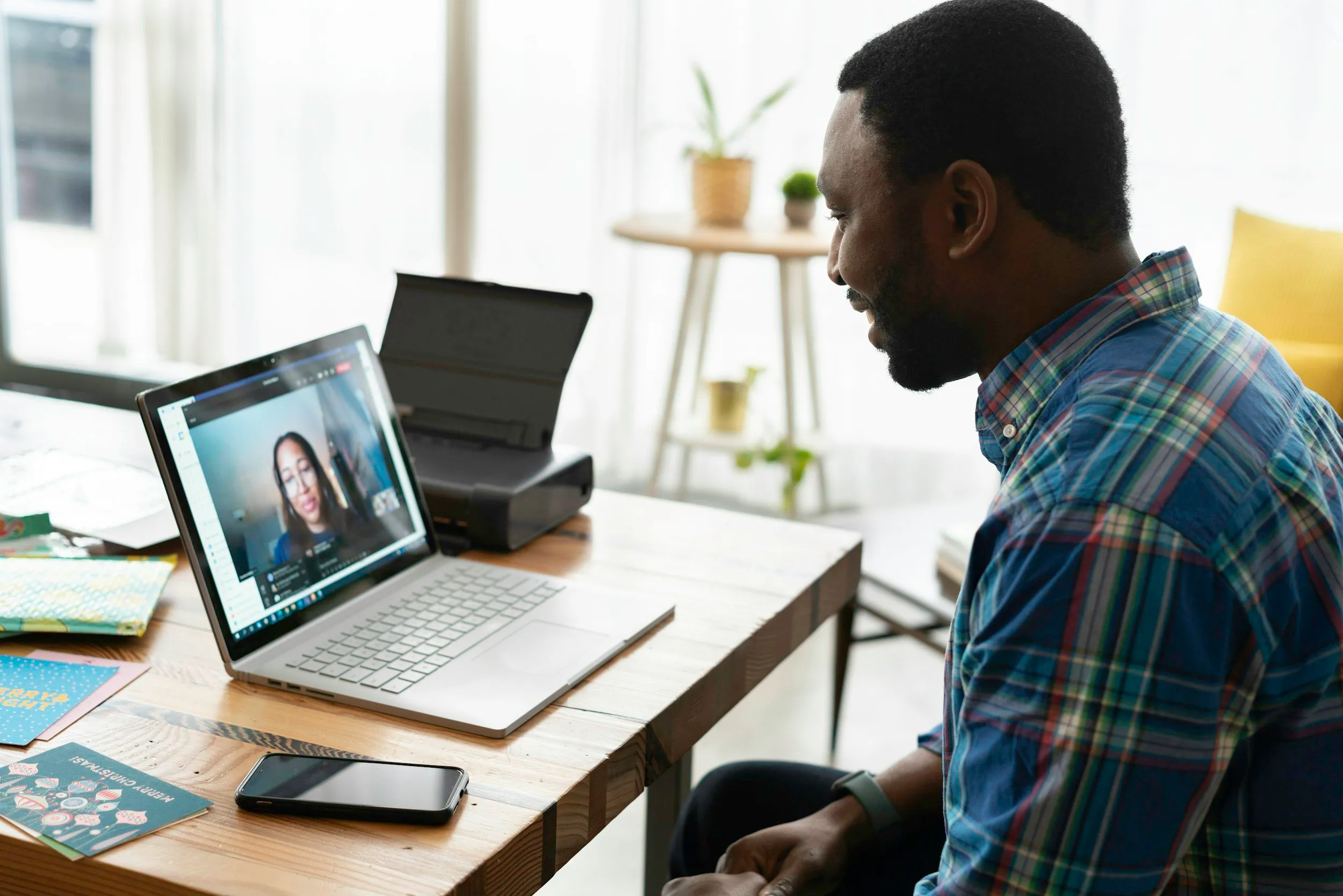 A client attending a video speech therapy appointment at home