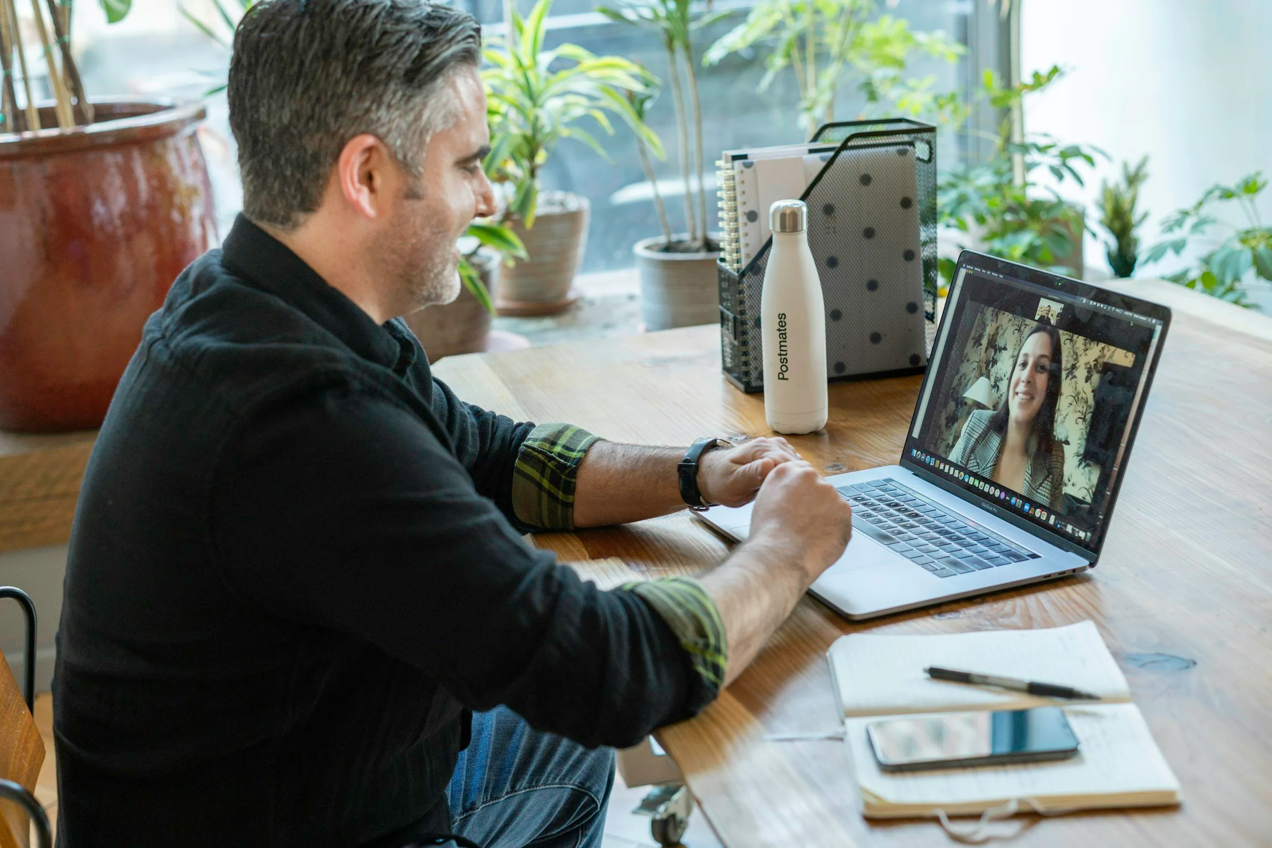 A virtual speech therapy session on a laptop